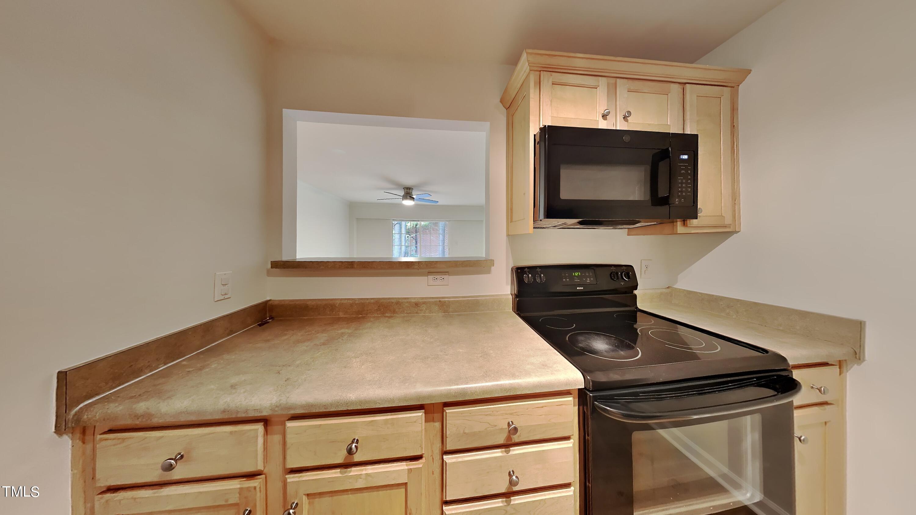 2300 Myron Drive, Unit 3 Raleigh, NC 27607 - Photo 5 of 12 a bathroom with a sink and a mirror