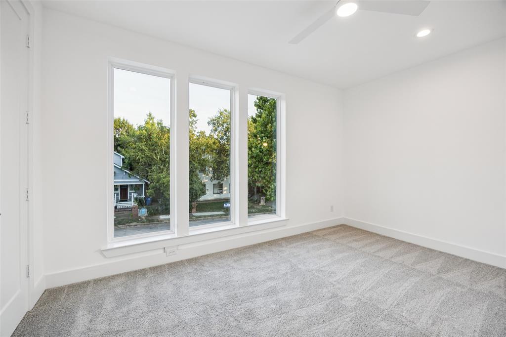 5633 East Side Avenue Dallas, TX 75214 - Photo 13 of 18 an empty room with an outdoor view and a window