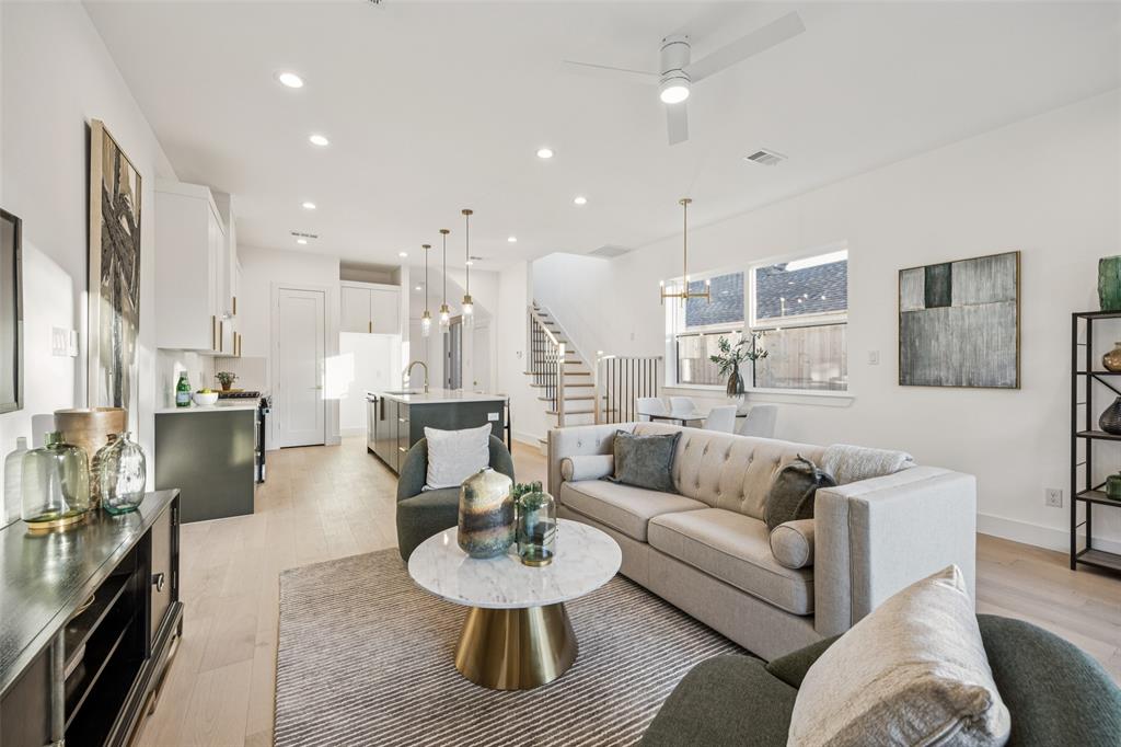 5633 East Side Avenue Dallas, TX 75214 - Photo 7 of 18 a living room with furniture and a view of kitchen