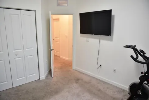 a view of a livingroom with bathroom
