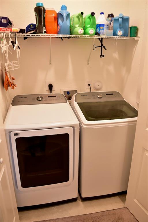 Princeton Homestead, FL 33032 - Photo 24 of 28 a utility room with dryer and washer