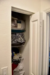 a close view of a sink and cabinets