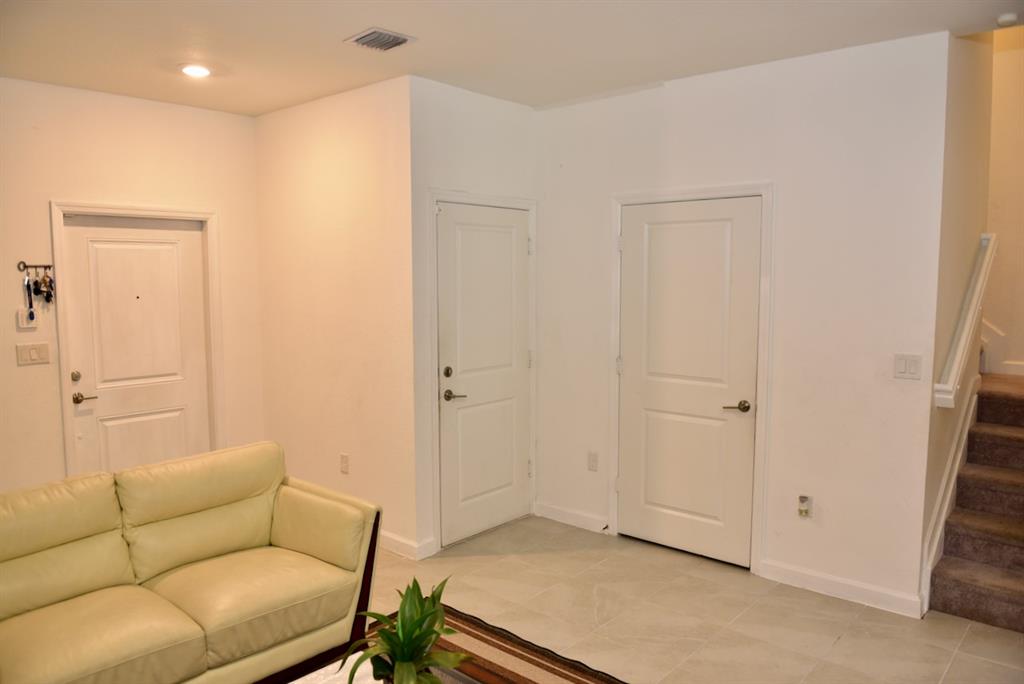 Princeton Homestead, FL 33032 - Photo 6 of 28 a living room with furniture and a window