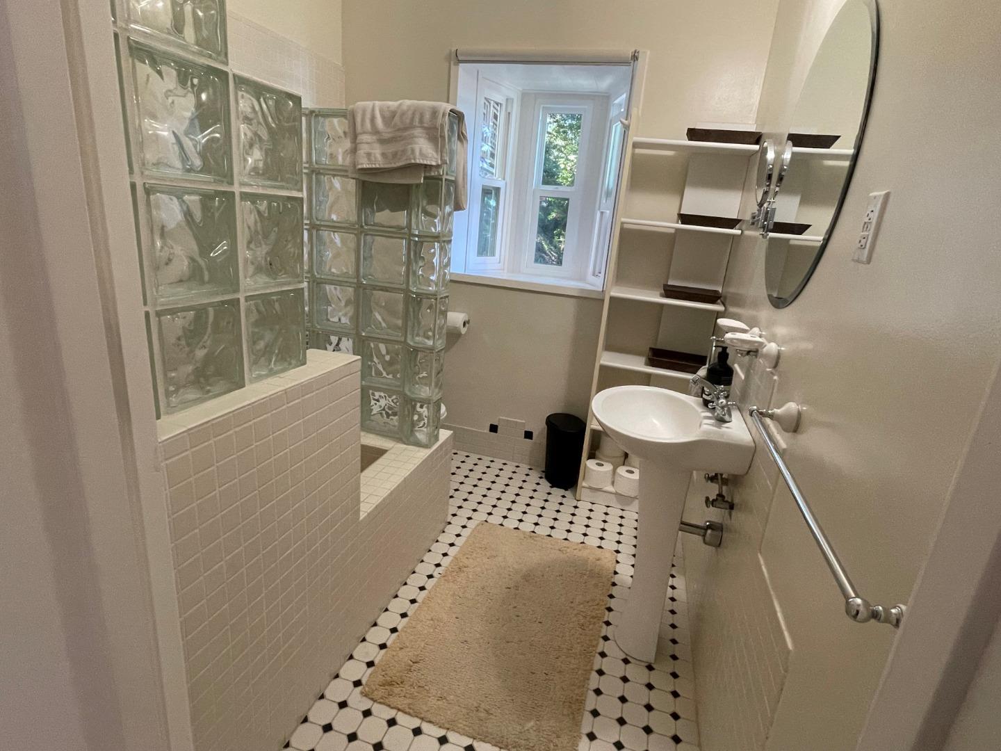 254 Swett Road Woodside, CA 94062 - Photo 12 of 31 a bathroom with a sink toilet and shower