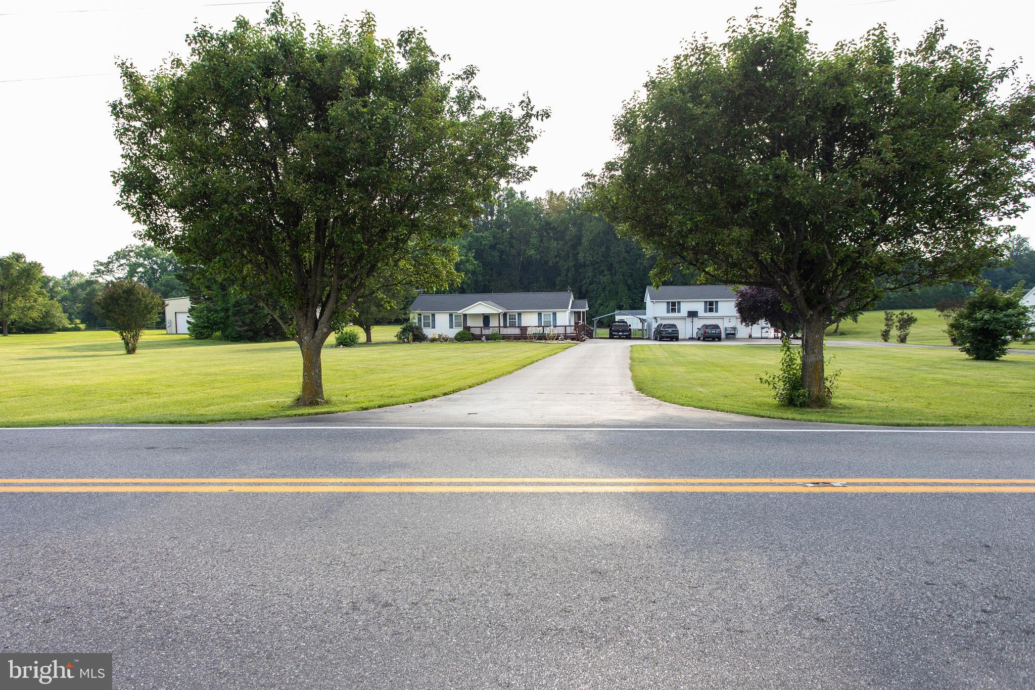 8305 Olivers Shop Road La Plata, MD 20646 - Photo 1 of 43 a view of a swimming pool and a yard