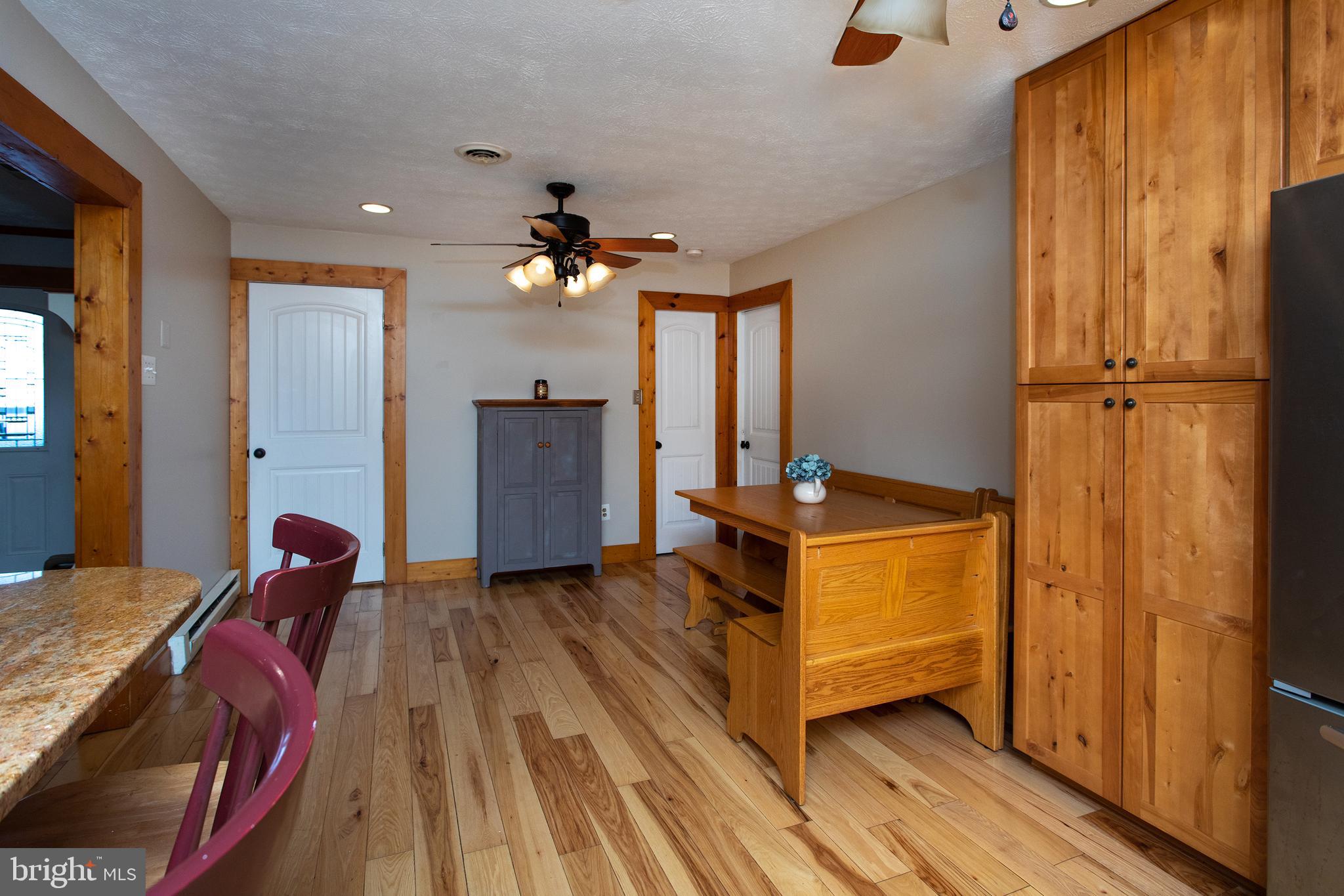 8305 Olivers Shop Road La Plata, MD 20646 - Photo 13 of 43 a bedroom with a bed and wooden floor