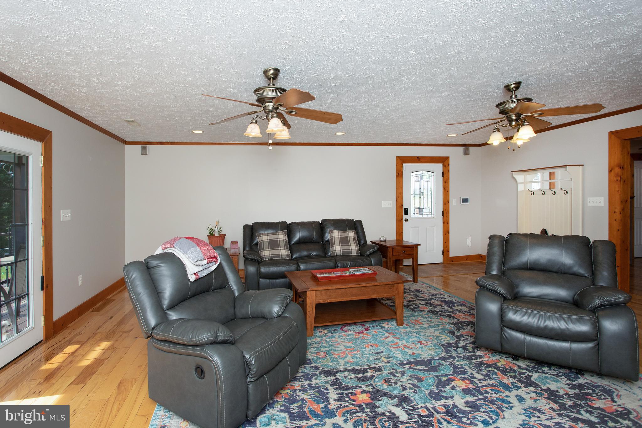 8305 Olivers Shop Road La Plata, MD 20646 - Photo 18 of 43 a living room with furniture a rug and white walls