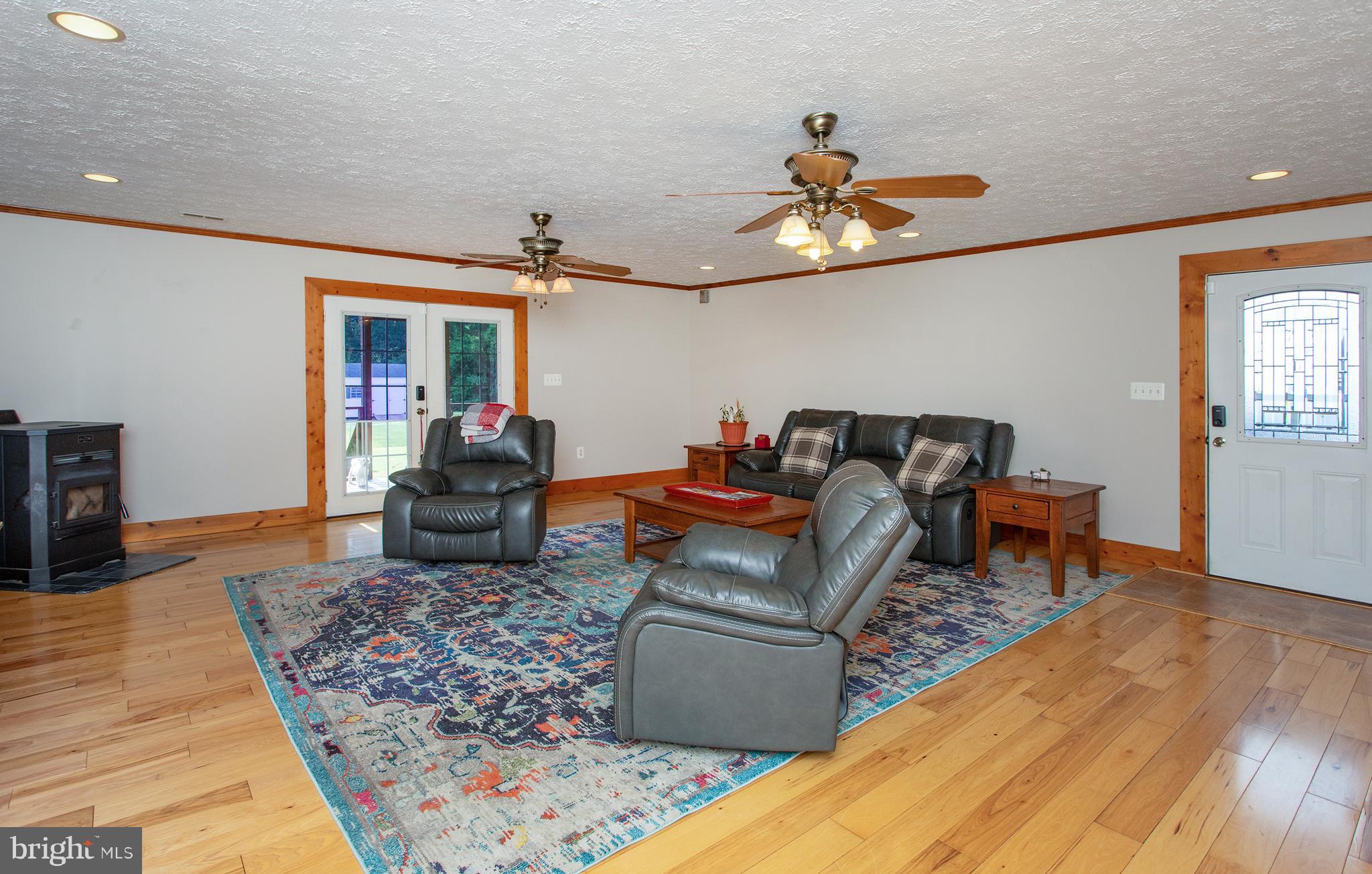 8305 Olivers Shop Road La Plata, MD 20646 - Photo 20 of 43 a living room with furniture rug and window