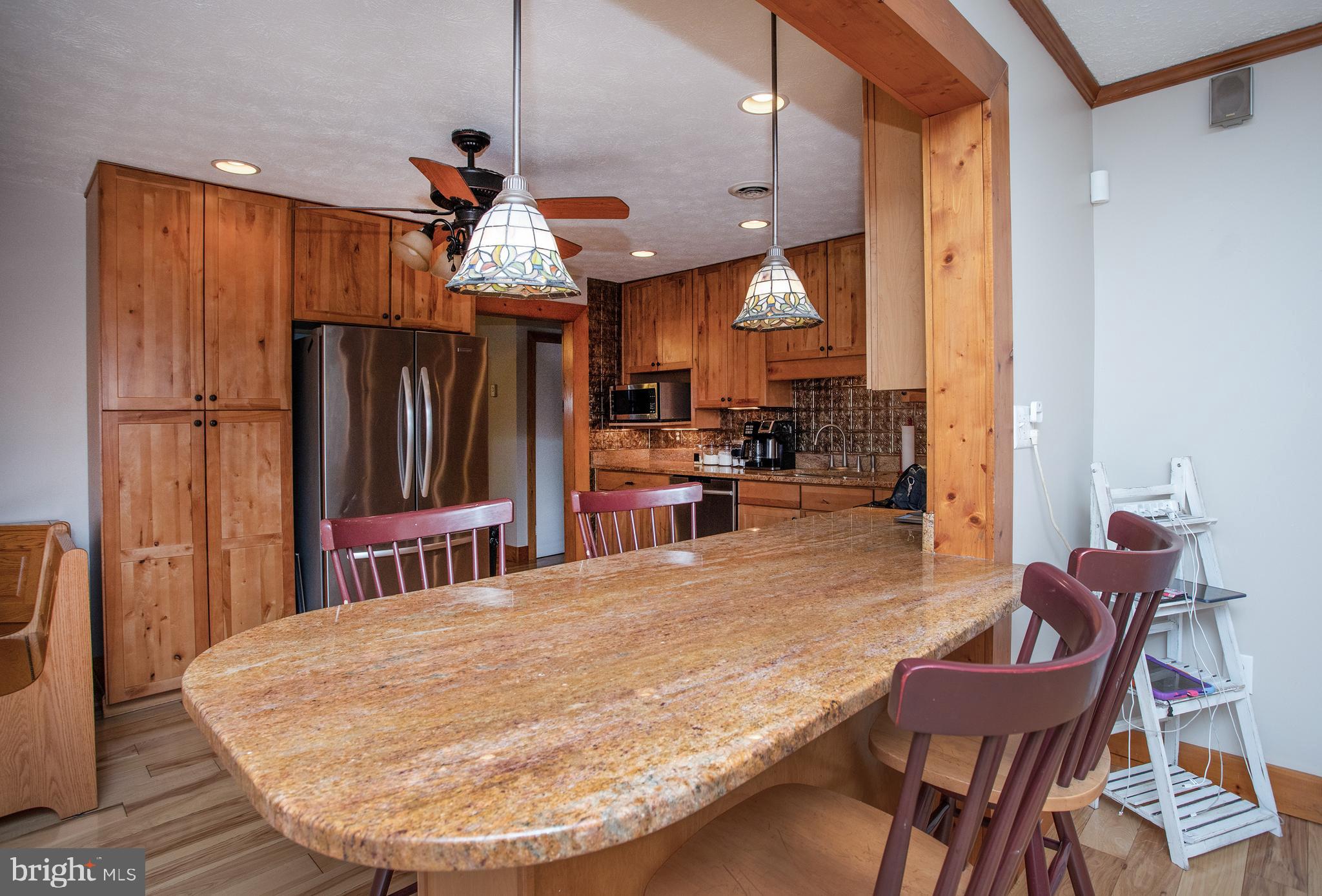 8305 Olivers Shop Road La Plata, MD 20646 - Photo 21 of 43 a swimming pool with table and chairs