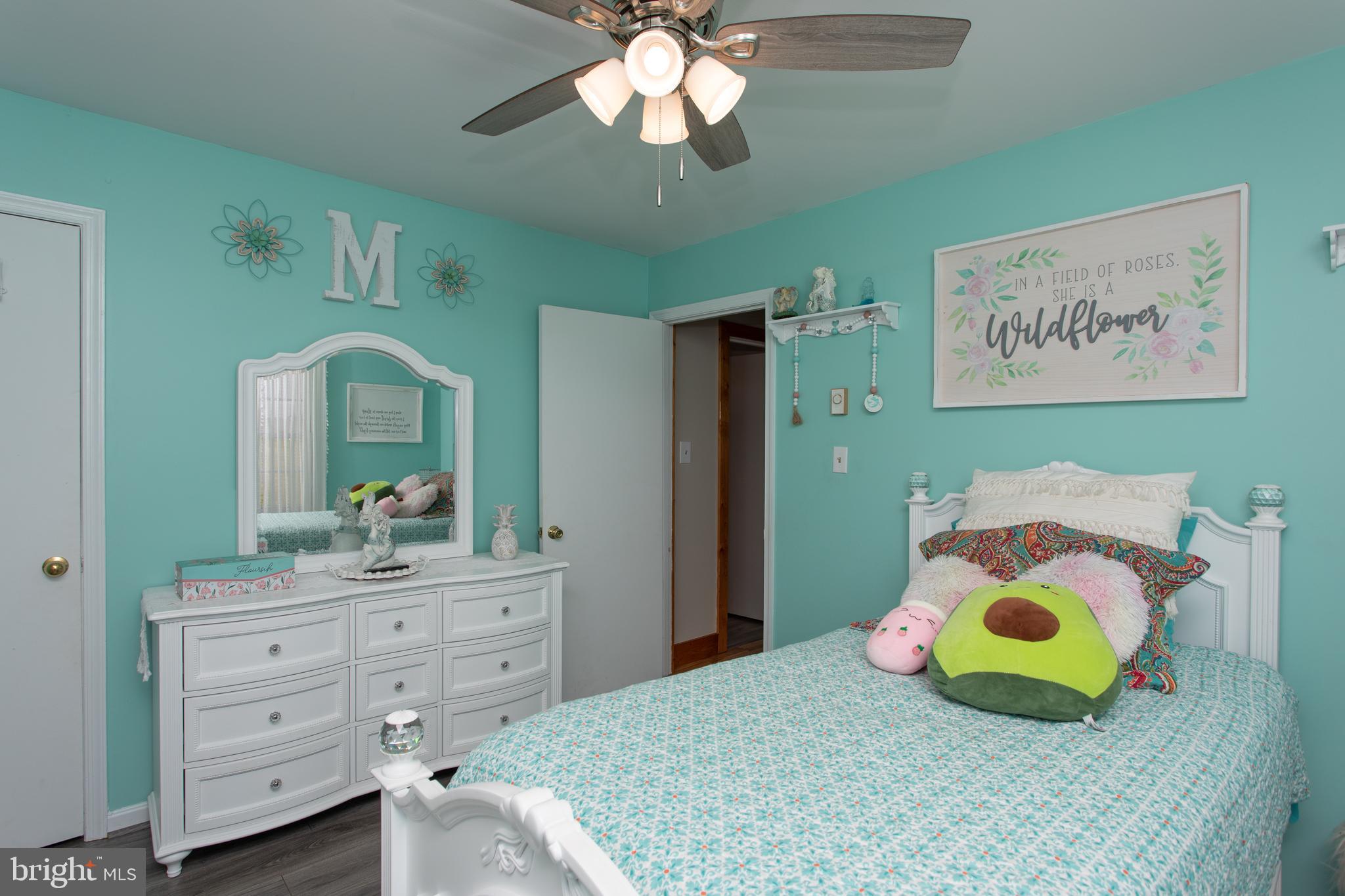 8305 Olivers Shop Road La Plata, MD 20646 - Photo 24 of 43 a bedroom with a bed and a dresser