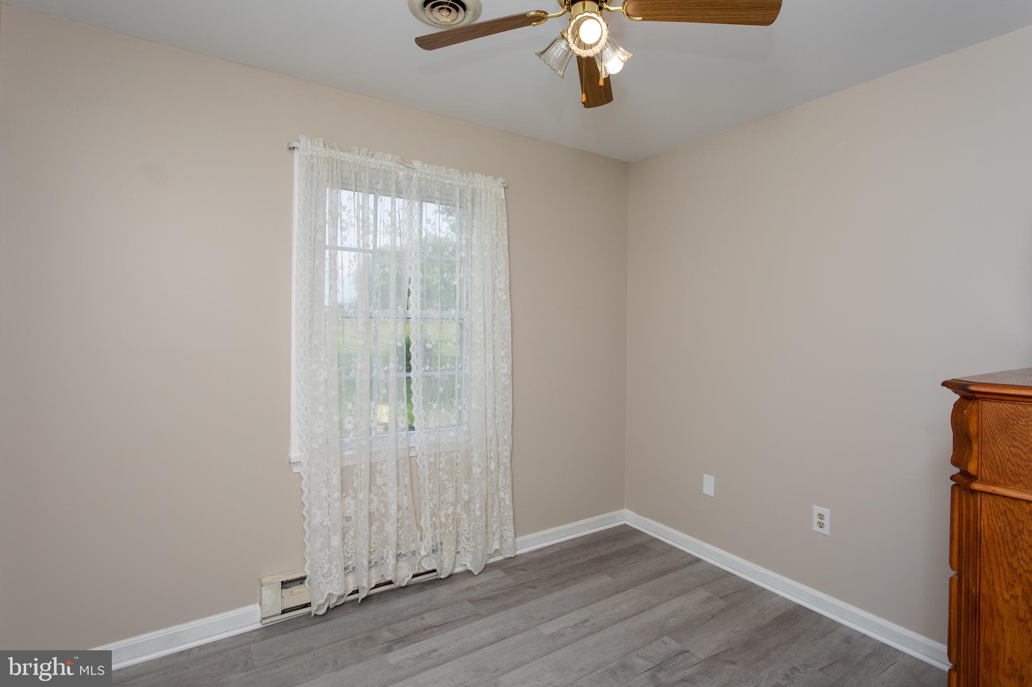 8305 Olivers Shop Road La Plata, MD 20646 - Photo 30 of 43 an empty room with a window