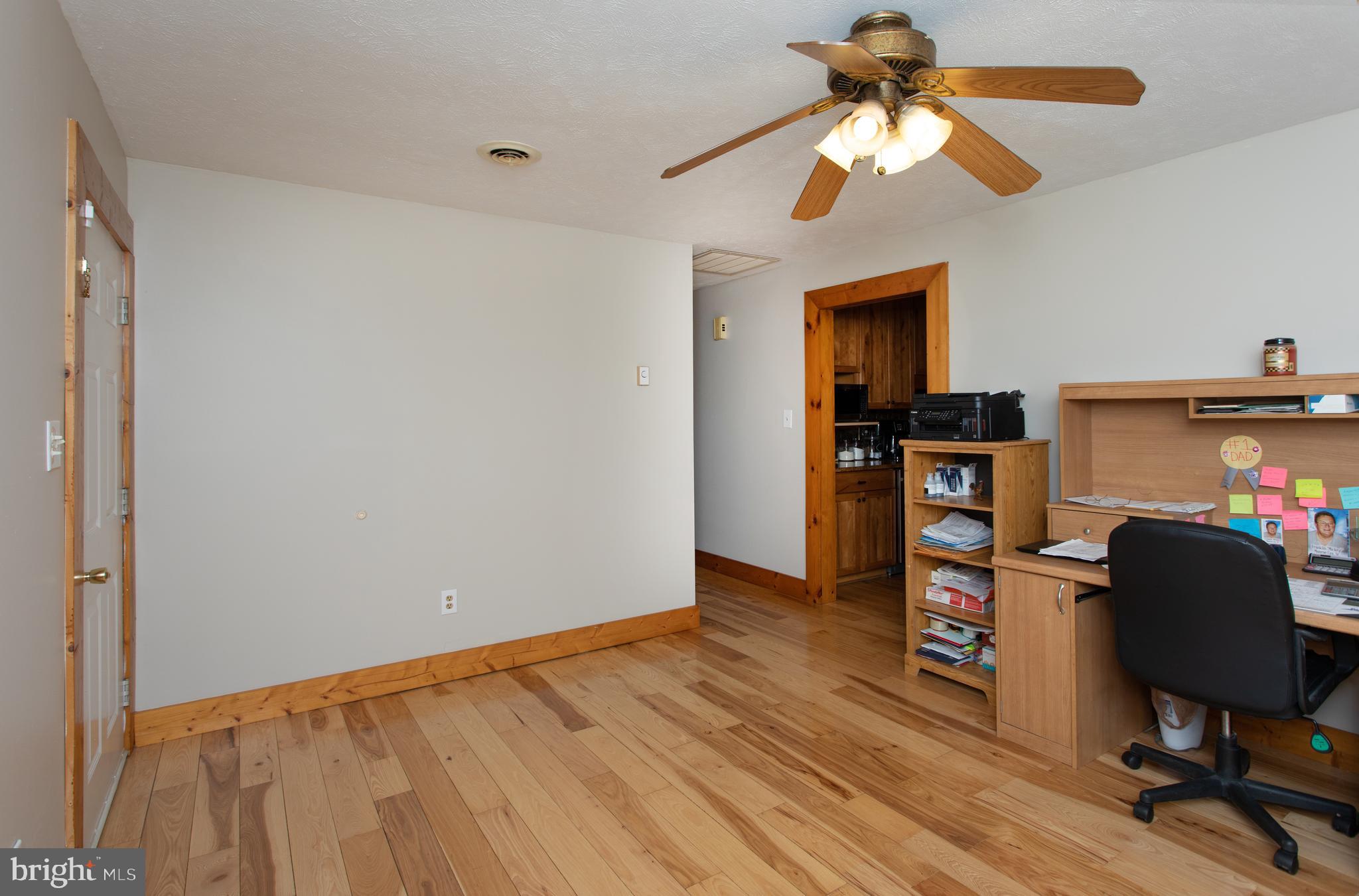 8305 Olivers Shop Road La Plata, MD 20646 - Photo 35 of 43 a view of workspace with wooden floor