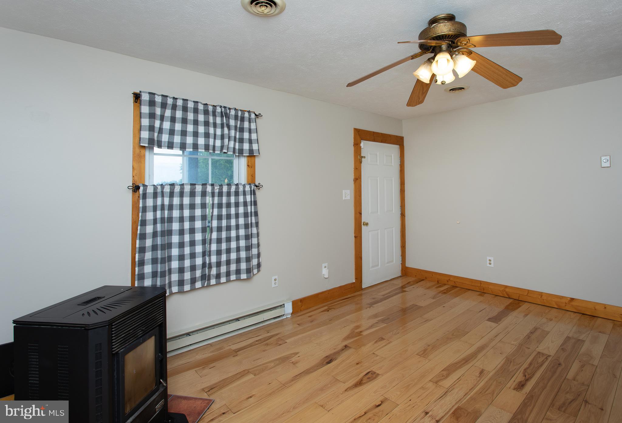 8305 Olivers Shop Road La Plata, MD 20646 - Photo 36 of 43 a view of an empty room with a chandelier fan