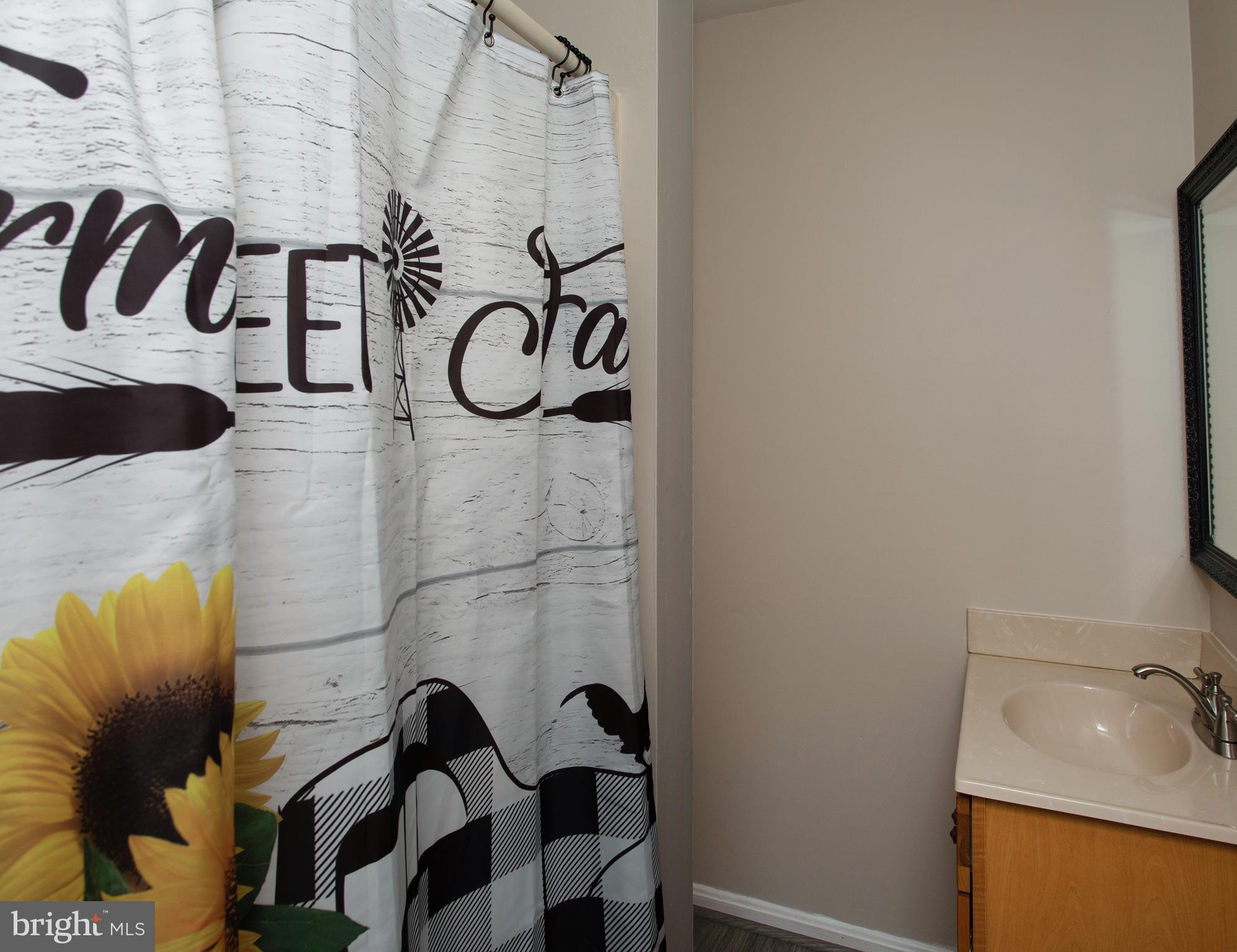 8305 Olivers Shop Road La Plata, MD 20646 - Photo 39 of 43 a bathroom with a bathtub and shower