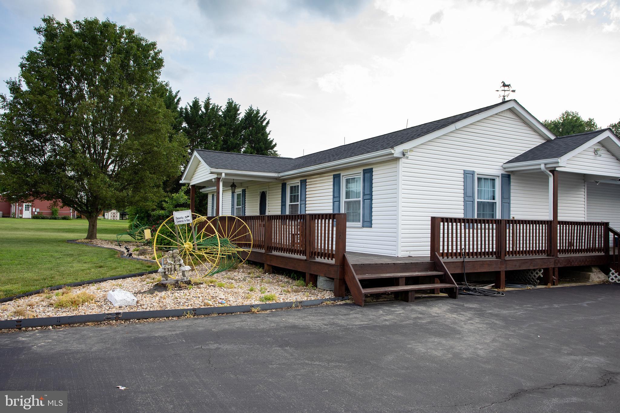 8305 Olivers Shop Road La Plata, MD 20646 - Photo 6 of 43 a view of a house with a yard and fence