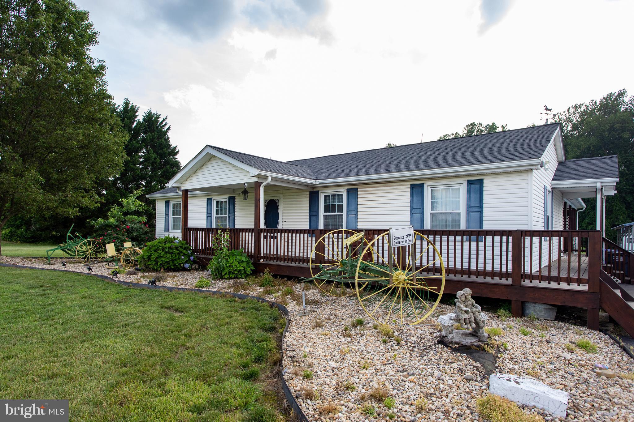 8305 Olivers Shop Road La Plata, MD 20646 - Photo 7 of 43 a view of house with a yard and sitting area