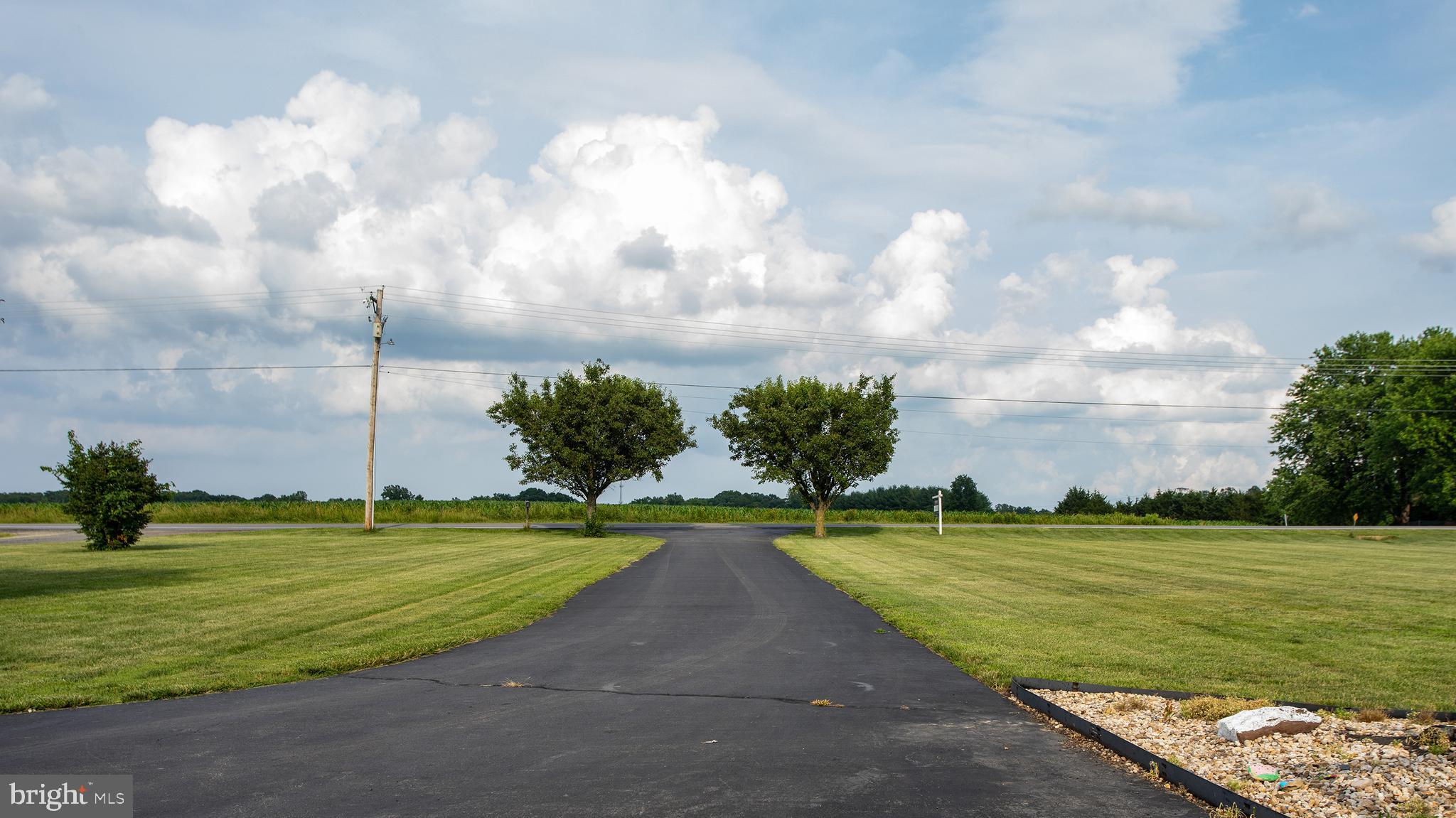 8305 Olivers Shop Road La Plata, MD 20646 - Photo 8 of 43 a view of a golf course with a lake