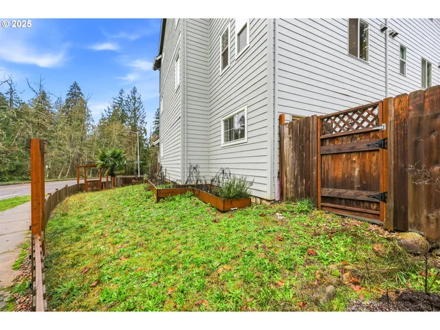 a backyard of a house with lots of green space