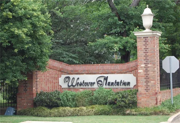 a view of outdoor space with signage and flags