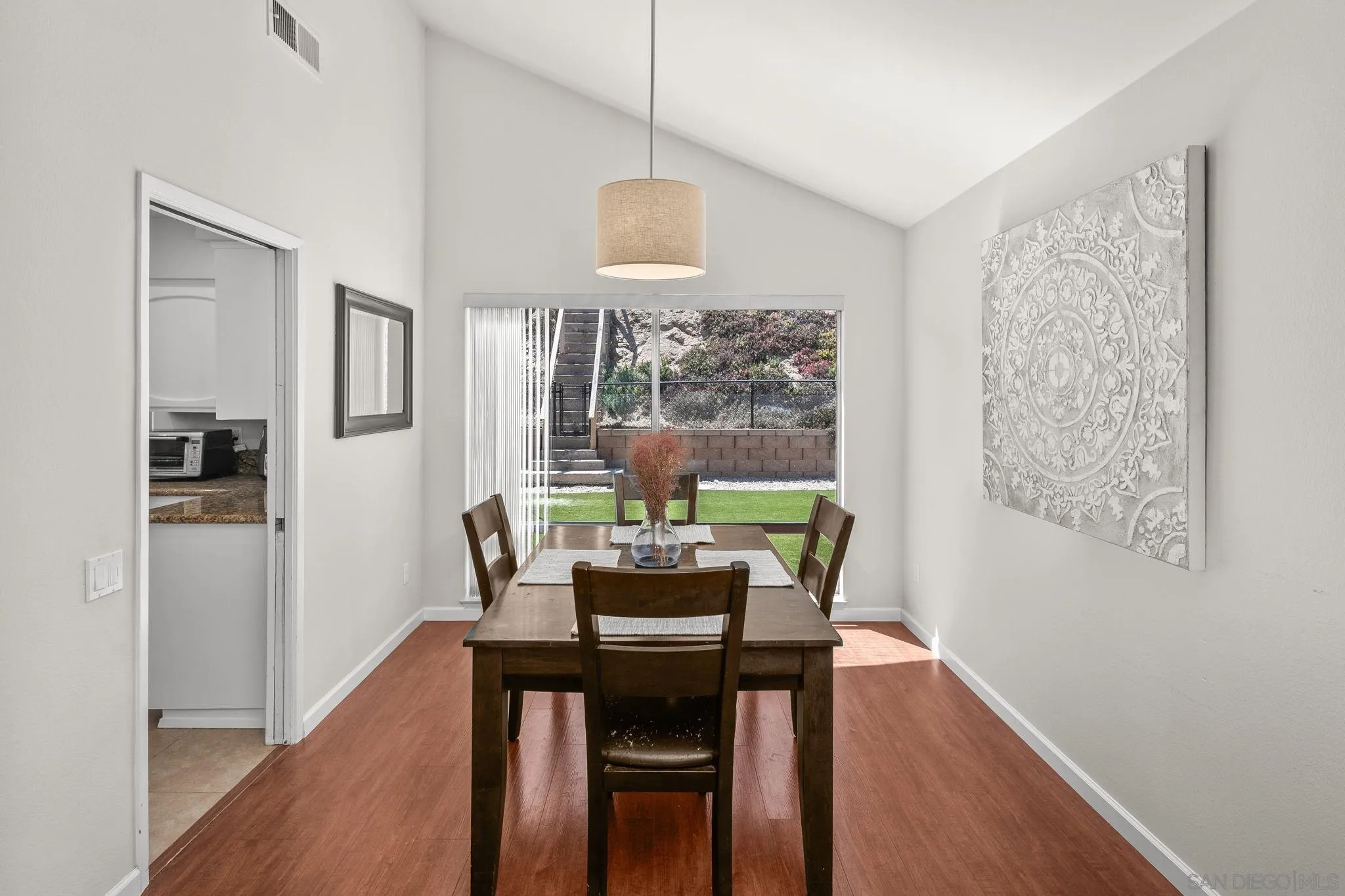 17078 Matinal Road San Diego, CA 92127 - Photo 4 of 41 a dining room with furniture and window