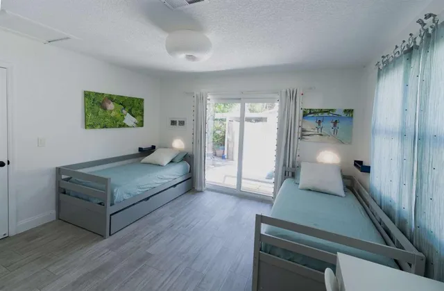 a living room with furniture and a gate