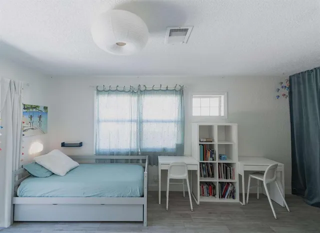 a view of dining room with furniture and window
