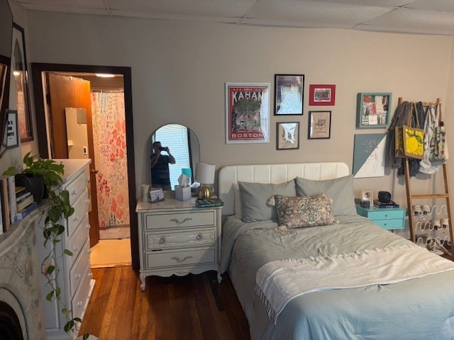 20 Benedict Street, Unit 1F Somerville, MA 02145 - Photo 5 of 12 a bedroom with a bed and a dresser