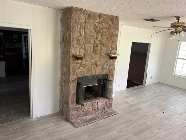 a view of a livingroom with a fireplace