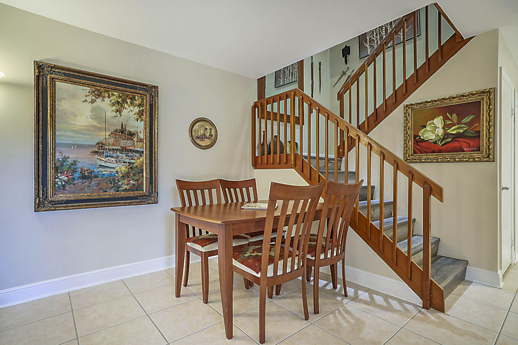 3071 30th Court Jupiter, FL 33477 - Photo 9 of 51 a view of staircase with furniture and a window