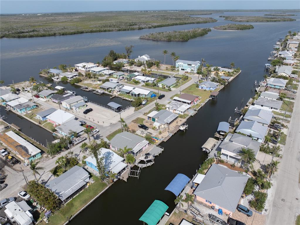 11476 May Street Matlacha, FL 33993 - Photo 14 of 43 an aerial view of a house with a lake view