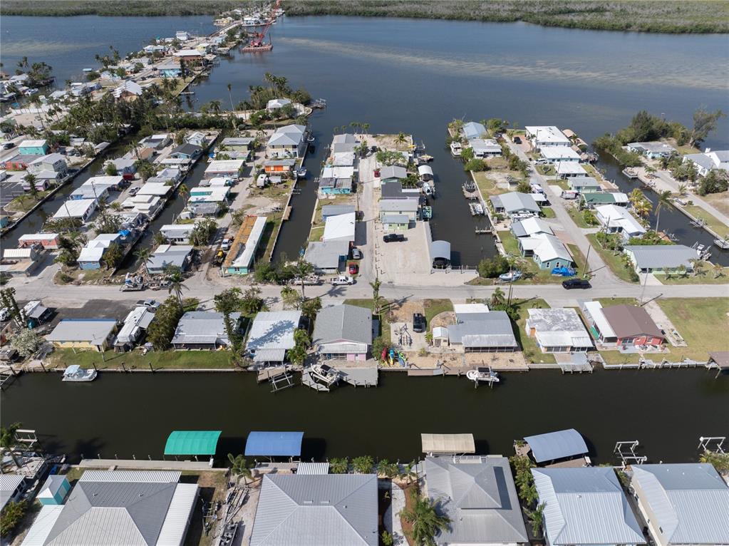 11476 May Street Matlacha, FL 33993 - Photo 15 of 43 an aerial view of a city
