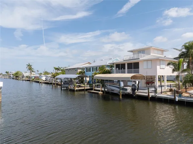 a view of a park with swings and slides