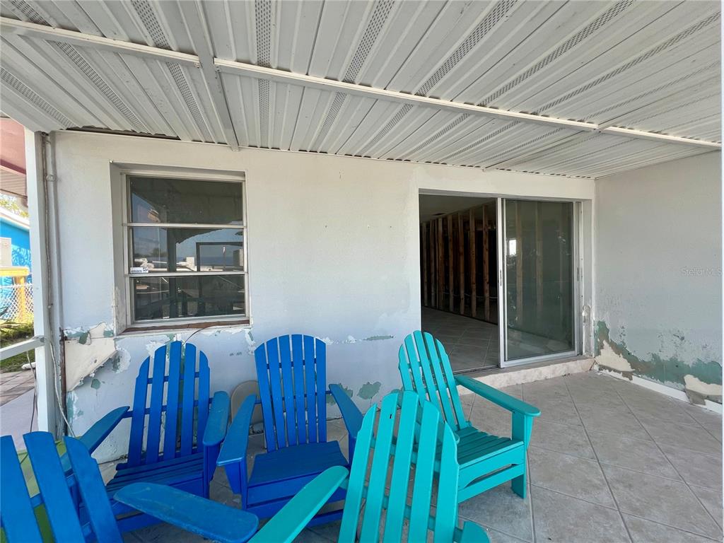 11476 May Street Matlacha, FL 33993 - Photo 29 of 43 a view of a balcony with chairs