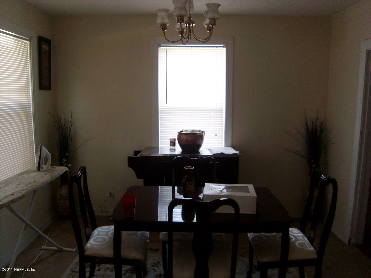 2219 Bayview Road Jacksonville, FL 32210 - Photo 4 of 11 a view of a dining room with furniture and window