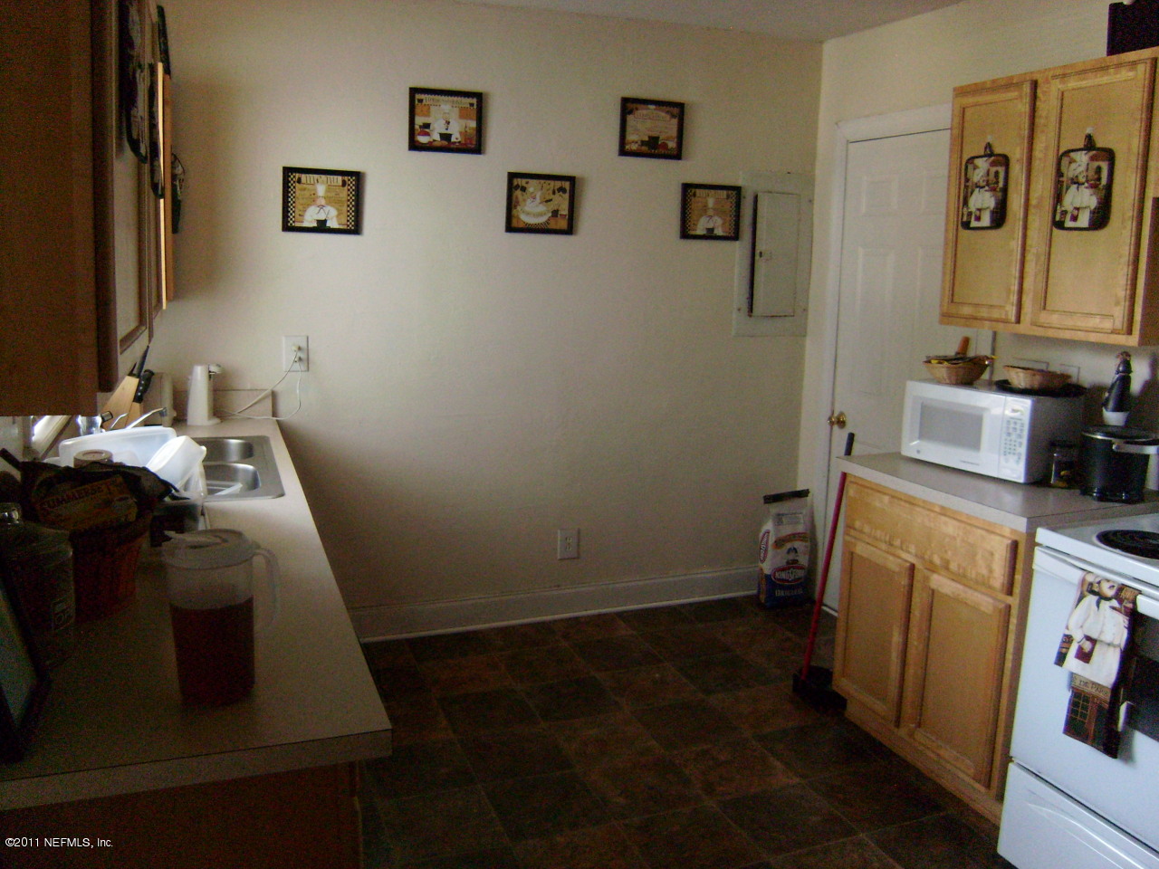 2219 Bayview Road Jacksonville, FL 32210 - Photo 7 of 11 a room with storage and utility