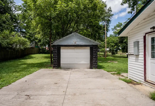 a front view of a house with yard