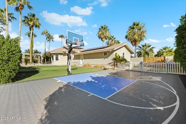 a view of outdoor space and basketball court