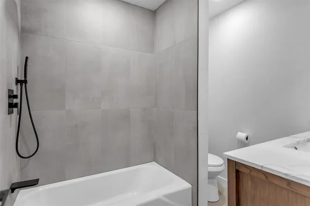 a bathroom with a bath tub and a shower