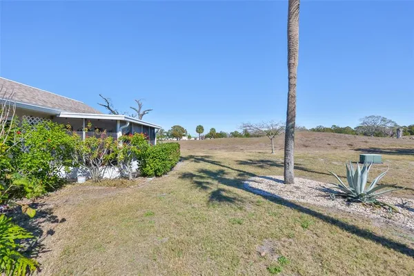 a view of a terrace with a lake view