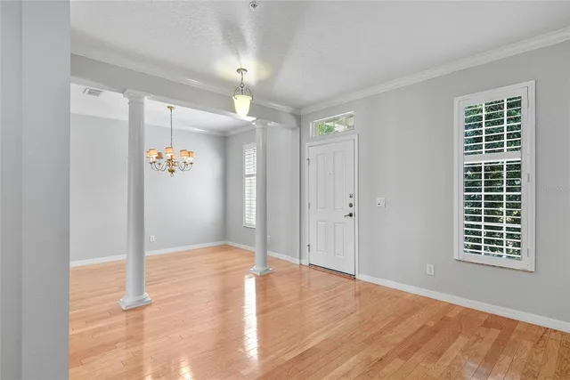 a view of livingroom with window and hardwood floor
