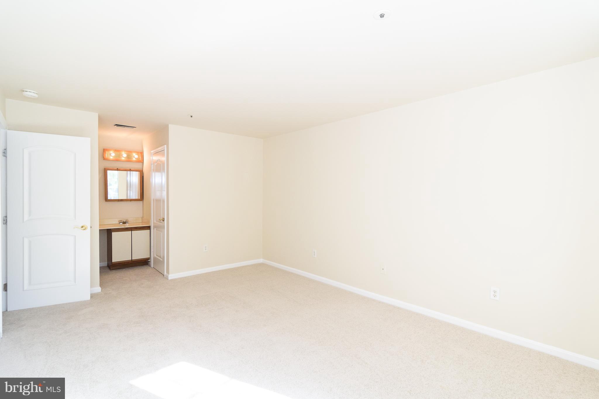 8559 Falls Run Road, Unit D Ellicott City, MD 21043 - Photo 13 of 25 Master bedroom w/walk-in closet