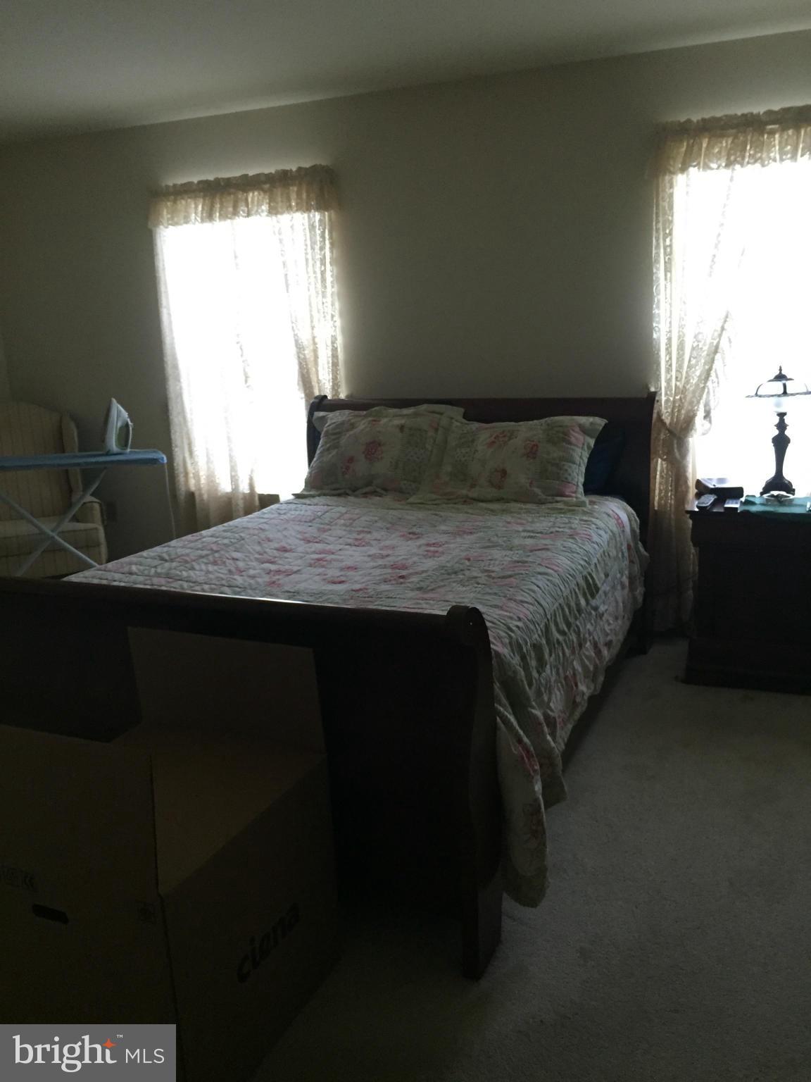 309 Assembly Point Court Odenton, MD 21113 - Photo 20 of 25 a bedroom with a bed and a window