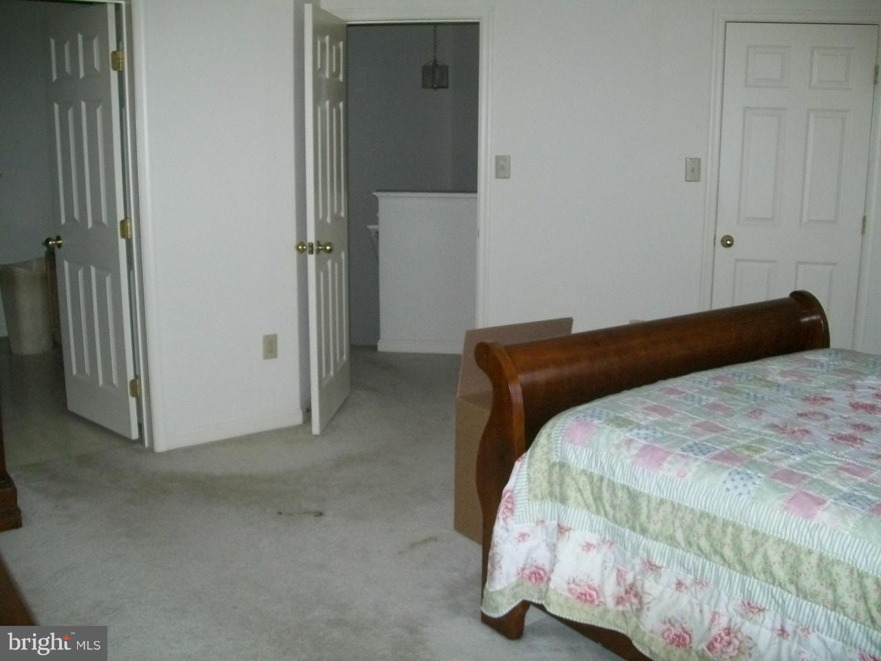 309 Assembly Point Court Odenton, MD 21113 - Photo 21 of 25 a bedroom with a bed and a window