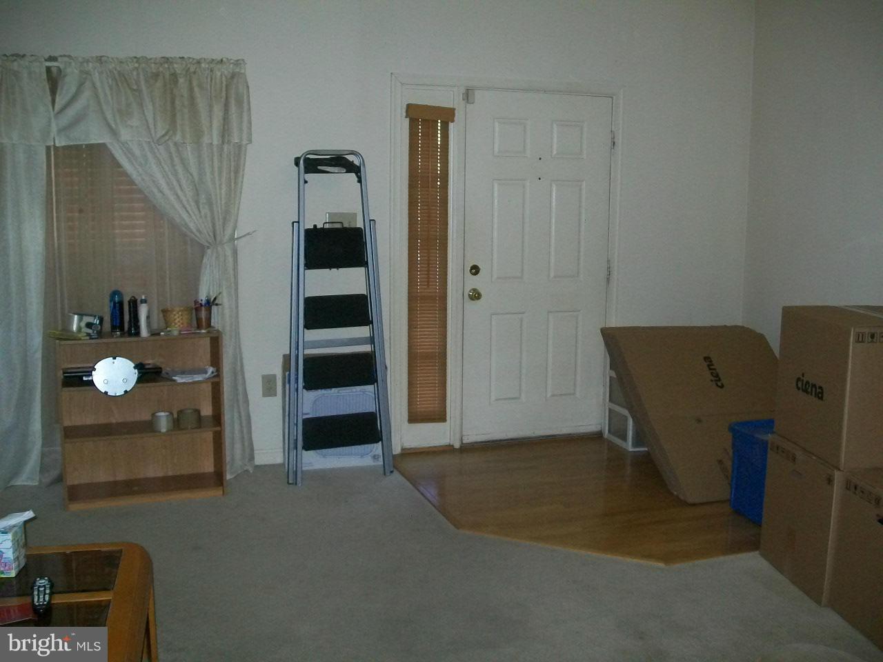 309 Assembly Point Court Odenton, MD 21113 - Photo 9 of 25 a view of an empty room with closet and cabinet