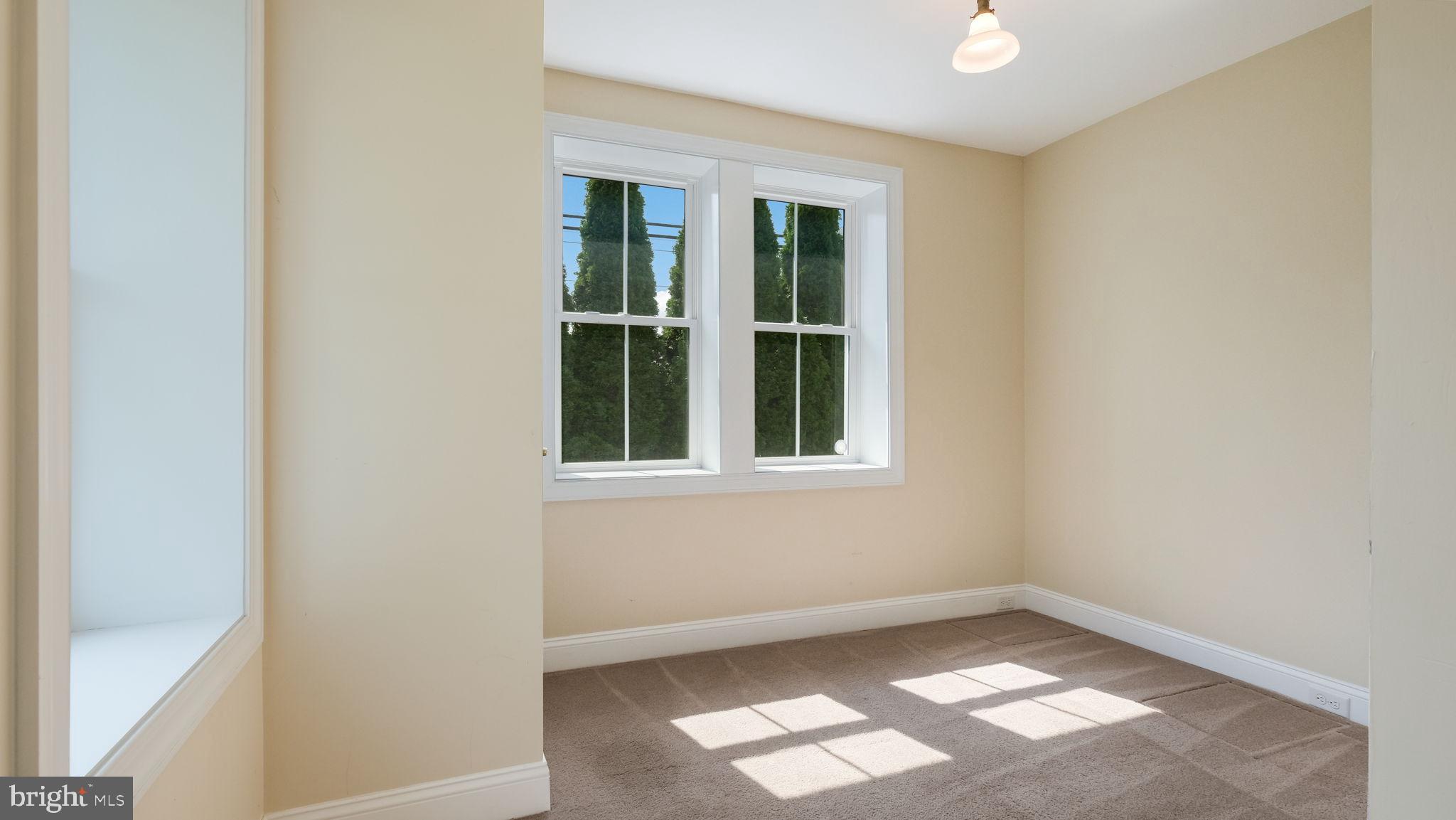 5087 Stump Road Pipersville, PA 18947 - Photo 14 of 35 Main level bedroom with natural light.