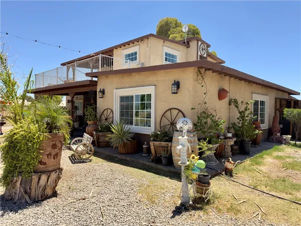 a front view of a house with patio
