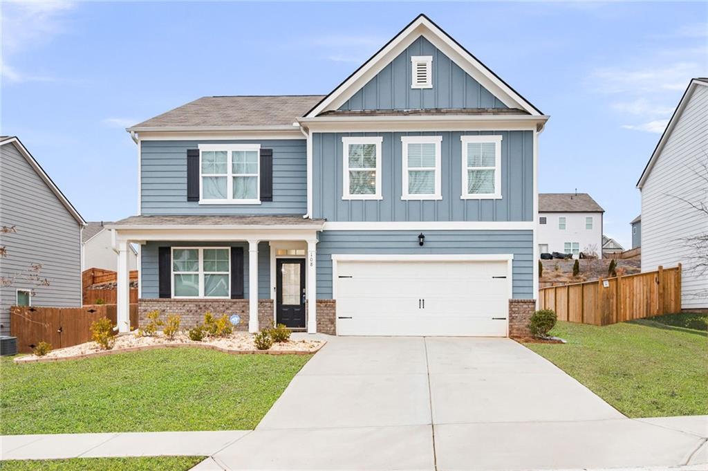 108 Berwick Crossing Dallas, GA 30157 - Photo 1 of 1 a front view of a house with a yard