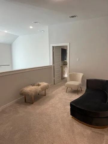 a bathroom with a double vanity sink and mirror