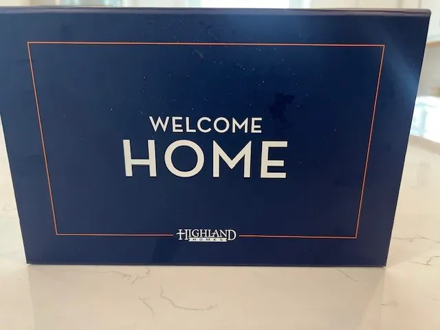 a view of a brick house with a large windows