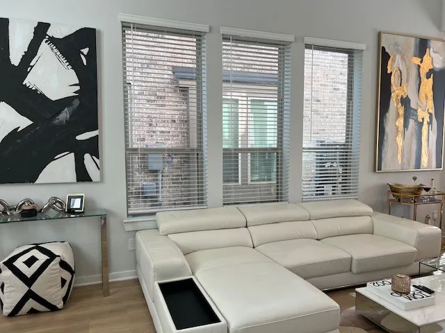 a room with furniture and a flat screen tv